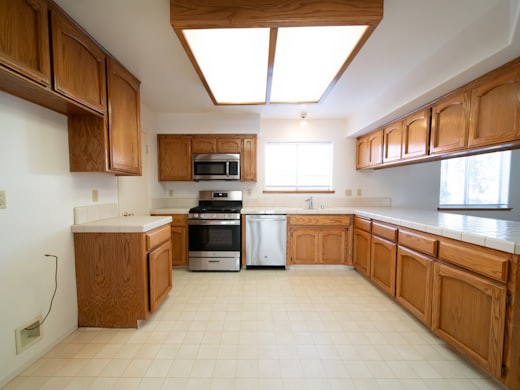 Oak Park bungalow kitchen before the addition, 1980s oak units