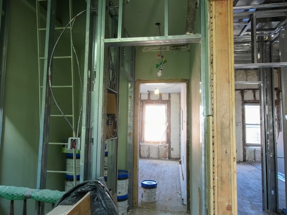 Hallway stripped back and protected before construction starts