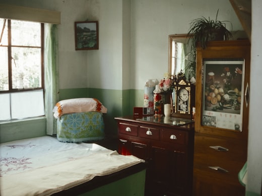 A bedroom before renovation, original fittings