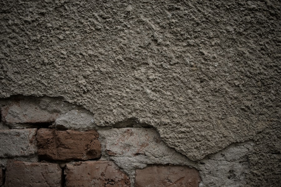 Masonry raked out by hand before repointing in matched mortar